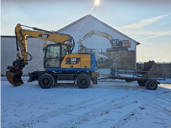 Pelle sur pneus CATERPILLAR M318F