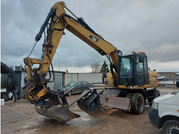 Pelle sur pneus CATERPILLAR M313D
