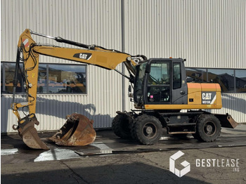 Pelle sur pneus CATERPILLAR M313D