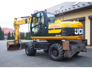 Pelle sur pneus Koparka kołowa JCB JS145W 2011 Koparka JCB: photos 5