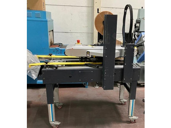 Machine d'emballage et de conditionnement