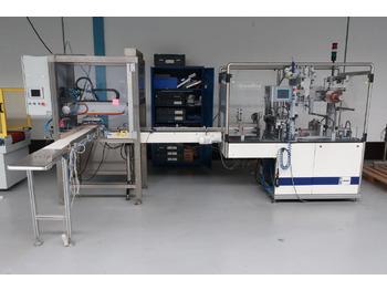 Machine d'emballage et de conditionnement