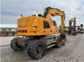 Pelle sur pneus Liebherr A 918 Compact: photos 5