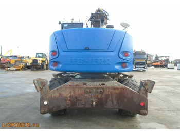 Pelle sur pneus Liebherr A 914 Compact: photos 5