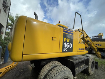 Pelle sur pneus Komatsu PC160LC: photos 3
