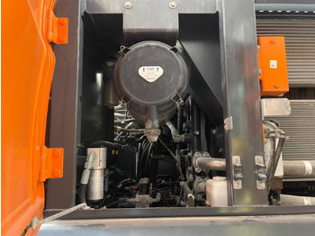 Pelle sur pneus DOOSAN DX210