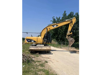 Pelle sur pneus CATERPILLAR