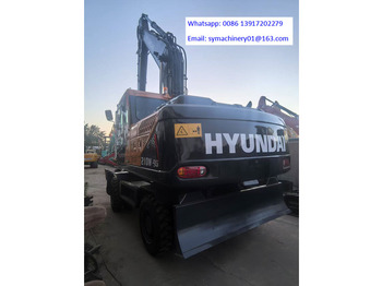 Pelle sur pneus HYUNDAI R210
