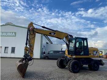 Pelle sur pneus CATERPILLAR M313D