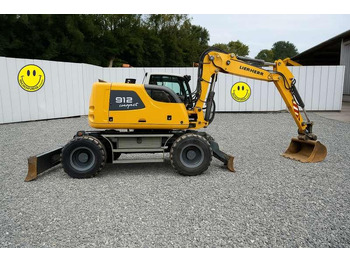 Pelle sur pneus LIEBHERR A 912