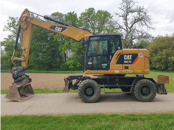 Pelle sur pneus CATERPILLAR