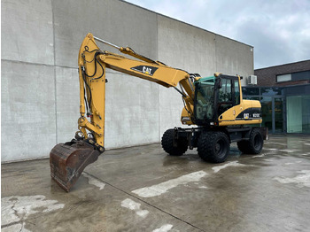Pelle sur pneus CATERPILLAR M313C