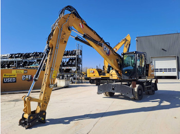 Pelle sur pneus CAT MH3024: photos 3