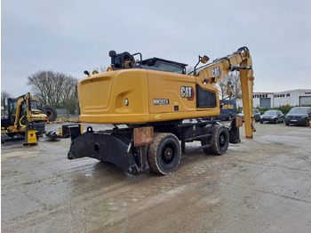 Pelle sur pneus CAT MH3024: photos 5