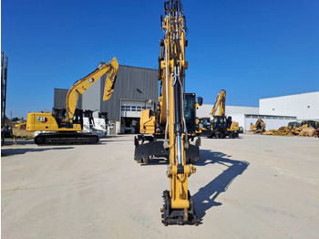 Pelle sur pneus CAT MH3024: photos 4