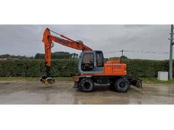 Pelle sur pneus NEW HOLLAND