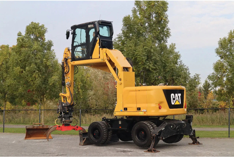 Caterpillar M314 07A | ELEVATING GRAB | ROTOTILT | BSS | GRAB | BUCKET - Pelle sur pneus: photos 3 Caterpillar M314 07A | ELEVATING GRAB | ROTOTILT | BSS | GRAB | BUCKET - Pelle sur pneus: photos 3