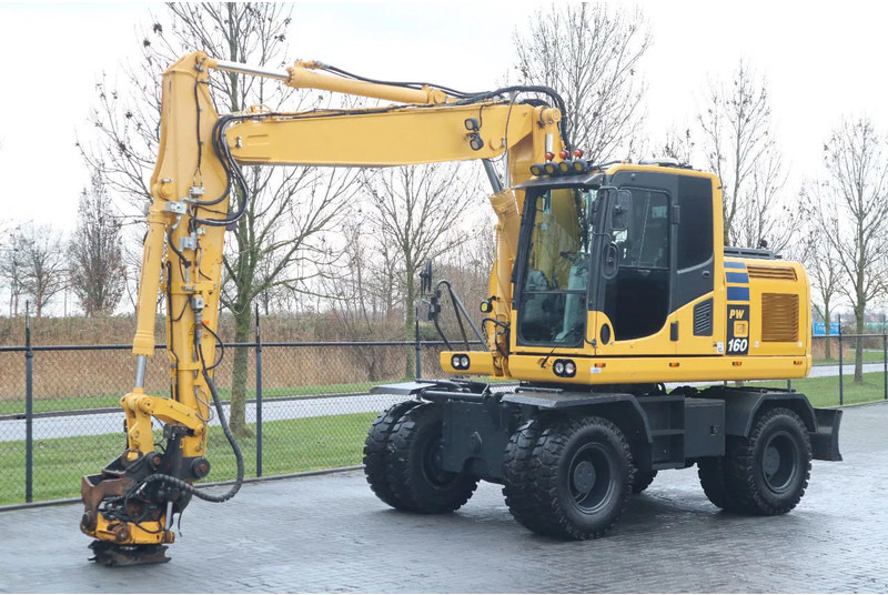Komatsu PW 160-10 | ROTOTILT | NEW TIRES - Pelle sur pneus: photos 2 Komatsu PW 160-10 | ROTOTILT | NEW TIRES - Pelle sur pneus: photos 2