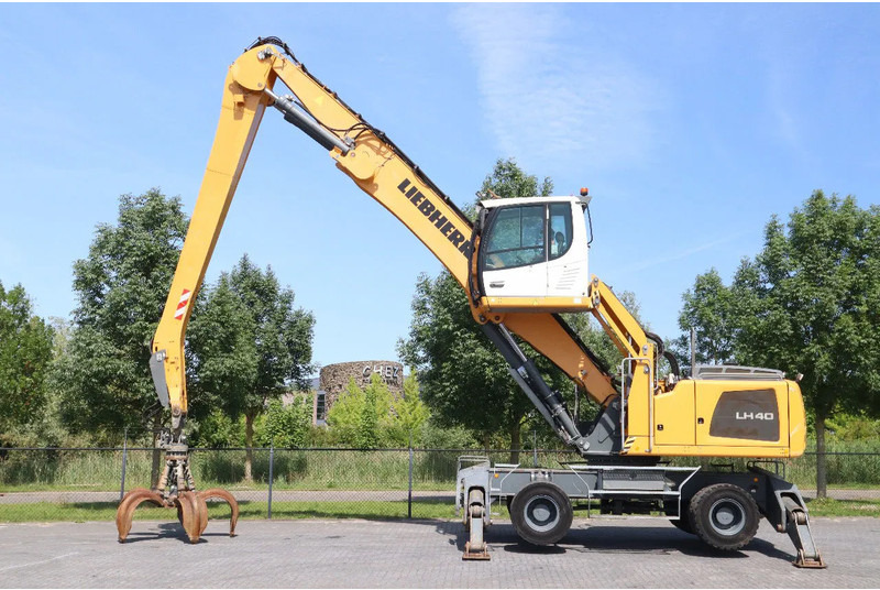 Liebherr LH 40 M LITRONIC | GRAB | QUICK COUPLER | 16 METER - Pelle sur pneus: photos 1 Liebherr LH 40 M LITRONIC | GRAB | QUICK COUPLER | 16 METER - Pelle sur pneus: photos 1