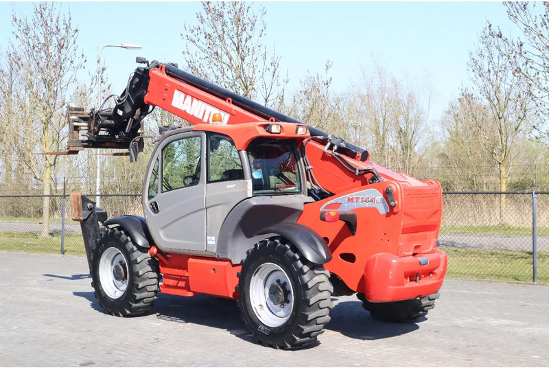 Manitou MT 1440 EASY | AIRCO | HYDR. FORKS - Chariot télescopique: photos 3 Manitou MT 1440 EASY | AIRCO | HYDR. FORKS - Chariot télescopique: photos 3
