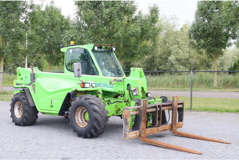 Merlo P72.10 | HYDR FORKS | 7.2 TON | 10 METER - Chariot télescopique: photos 5 Merlo P72.10 | HYDR FORKS | 7.2 TON | 10 METER - Chariot télescopique: photos 5