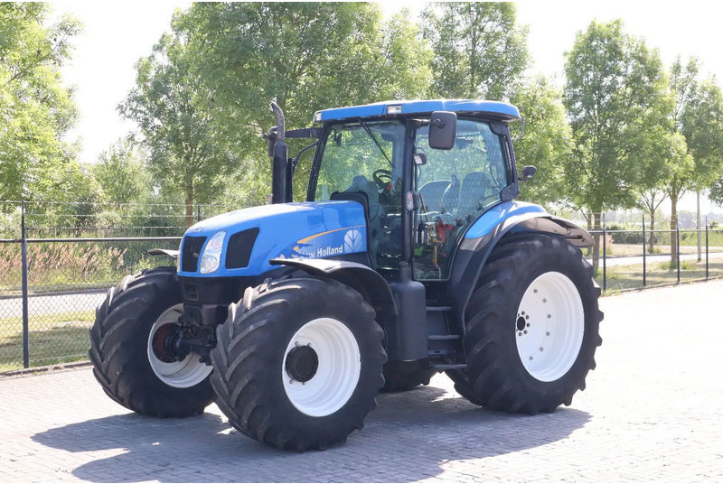 New Holland TS135A | 40 KM/H | 4X4 | SUPERSTEER - Tracteur agricole: photos 1 New Holland TS135A | 40 KM/H | 4X4 | SUPERSTEER - Tracteur agricole: photos 1