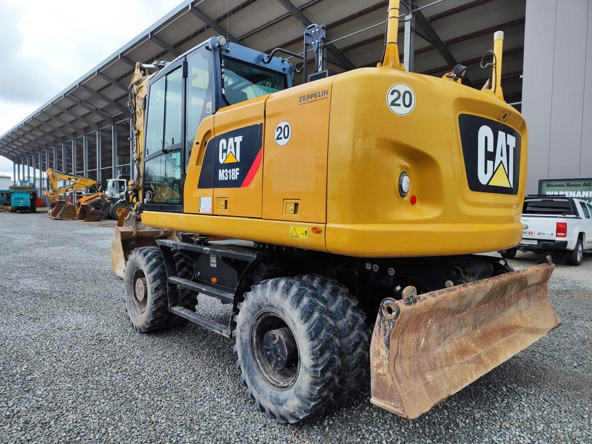 Caterpillar M318F - Pelle sur pneus: photos 1 Caterpillar M318F - Pelle sur pneus: photos 1