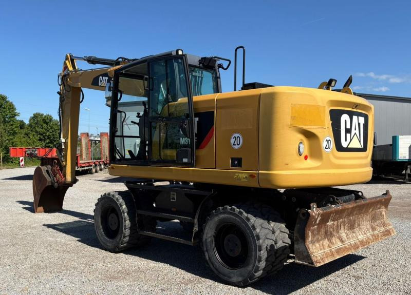 Caterpillar M318F - Pelle sur pneus: photos 1 Caterpillar M318F - Pelle sur pneus: photos 1