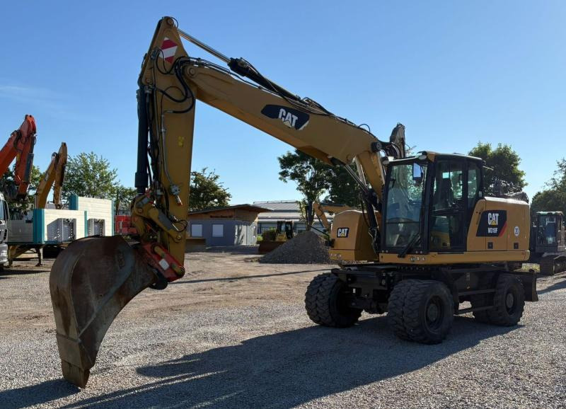 Caterpillar M318F - Pelle sur pneus: photos 2 Caterpillar M318F - Pelle sur pneus: photos 2