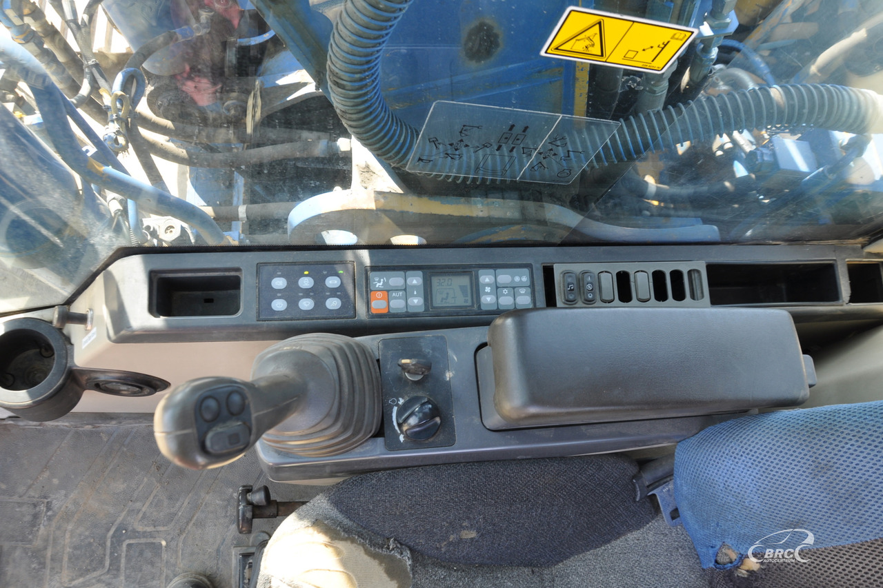 Pelle sur chenille Caterpillar 318C: photos 11