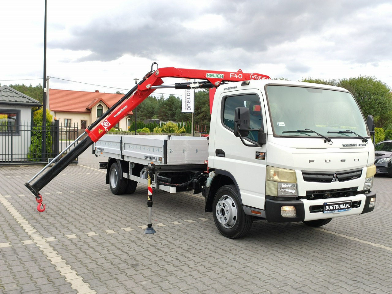 Mitsubishi Canter Fuso 7C15 3.0/150KM HDS FASSI F40 UNIKAT Super Stan !!! - Camion plateau, Camion grue: photos 1 Mitsubishi Canter Fuso 7C15 3.0/150KM HDS FASSI F40 UNIKAT Super Stan !!! - Camion plateau, Camion grue: photos 1