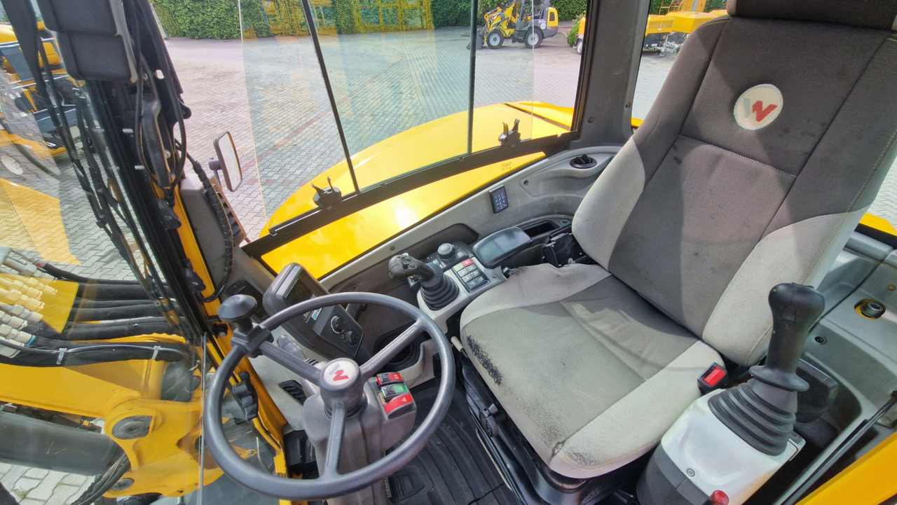 Pelle sur pneus WACKER NEUSON EW65: photos 12