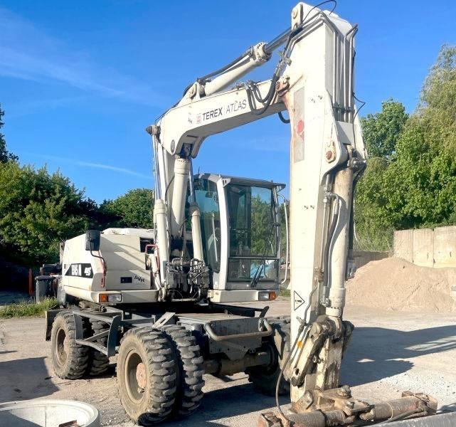 Atlas 1505  - Pelle sur pneus: photos 3 Atlas 1505  - Pelle sur pneus: photos 3