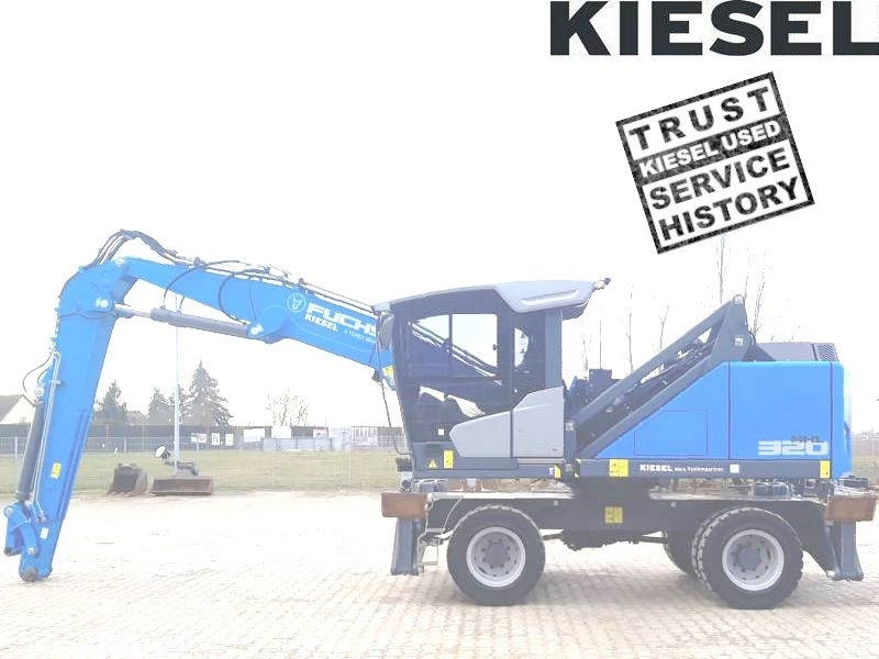 Fuchs MHL 320 F - Pelle de manutention: photos 1 Fuchs MHL 320 F - Pelle de manutention: photos 1