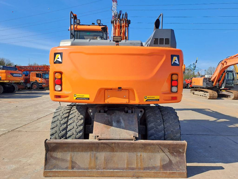 Doosan DX140W-5 - Pelle sur pneus: photos 3 Doosan DX140W-5 - Pelle sur pneus: photos 3