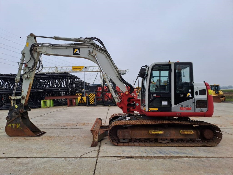 Takeuchi TB 2150 - Pelle sur chenille: photos 1 Takeuchi TB 2150 - Pelle sur chenille: photos 1