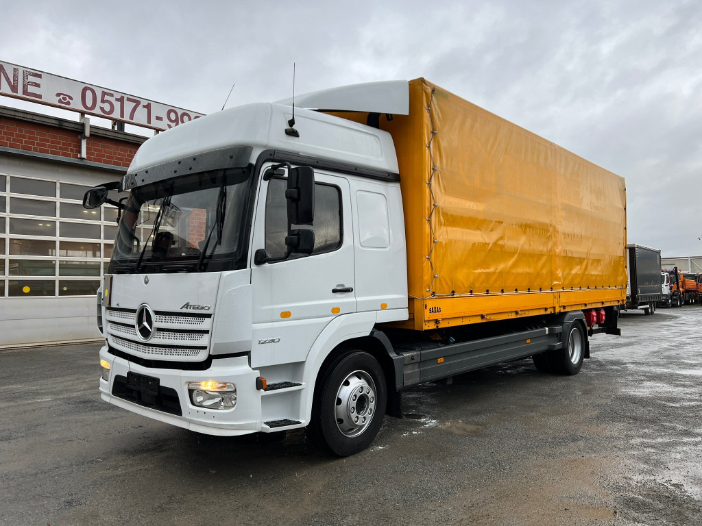 MERCEDES-BENZ Atego 1230 L Pritsche LBW Lg.Fhs Hochd. 7,2m+LBW - Camion à rideaux coulissants: photos 1 MERCEDES-BENZ Atego 1230 L Pritsche LBW Lg.Fhs Hochd. 7,2m+LBW - Camion à rideaux coulissants: photos 1