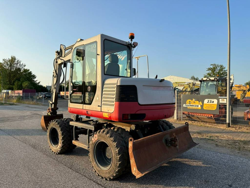 Takeuchi TB 175 W 8,7 ton. Klima Turbo 77 PS  - Pelle sur pneus: photos 5 Takeuchi TB 175 W 8,7 ton. Klima Turbo 77 PS  - Pelle sur pneus: photos 5