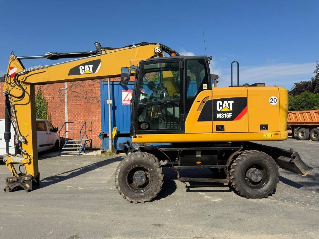 CAT M 316F - Pelle sur pneus: photos 1 CAT M 316F - Pelle sur pneus: photos 1