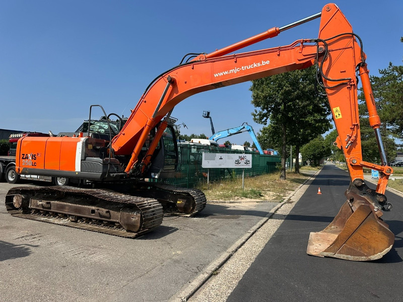 Hitachi ZAXIS ZX250LC-3 *FULL HYDR* - 25.6 T - QUICK HITCH - ISUZU - CE - BE MACHINE - GOOD CONDITION - Pelle sur chenille: photos 1 Hitachi ZAXIS ZX250LC-3 *FULL HYDR* - 25.6 T - QUICK HITCH - ISUZU - CE - BE MACHINE - GOOD CONDITION - Pelle sur chenille: photos 1