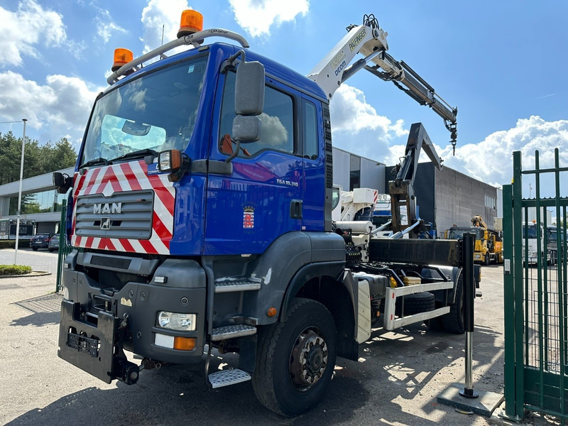 MAN TGA 18.310 4x4 HOOKLIFT + CRANE PALFINGER PK12000 - RADIO - ROTATOR - STEEL SPRING / HUB REDUCTION - MANUAL ZF - BE TRUCK - Camion ampliroll, Camion grue: photos 3 MAN TGA 18.310 4x4 HOOKLIFT + CRANE PALFINGER PK12000 - RADIO - ROTATOR - STEEL SPRING / HUB REDUCTION - MANUAL ZF - BE TRUCK - Camion ampliroll, Camion grue: photos 3