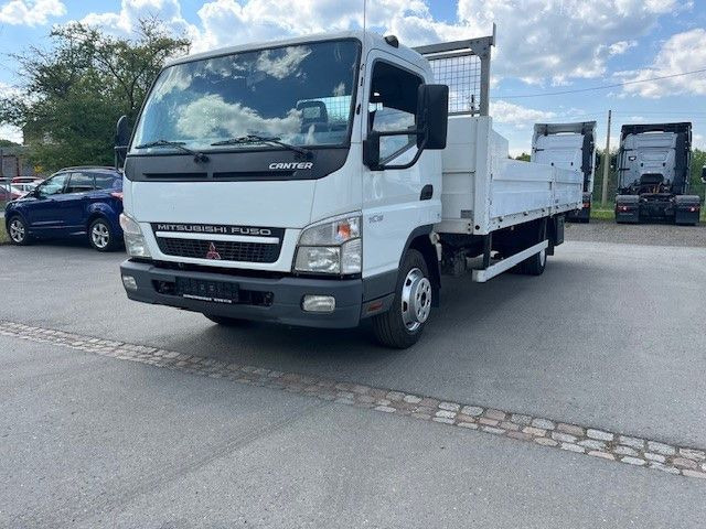 Mitsubishi Canter FE 85 Pritschenwagen - Camion plateau: photos 1 Mitsubishi Canter FE 85 Pritschenwagen - Camion plateau: photos 1