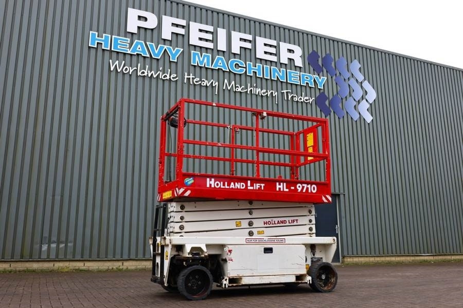 Holland Lift Ecostar HL-9710 Electric, 12m Working Height, 325k - Nacelle ciseaux: photos 1 Holland Lift Ecostar HL-9710 Electric, 12m Working Height, 325k - Nacelle ciseaux: photos 1