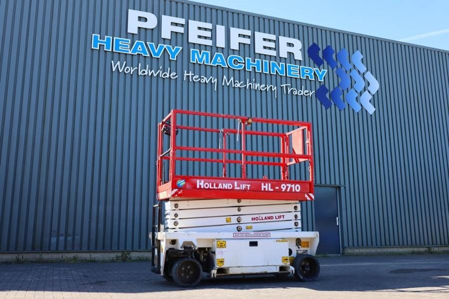 Holland Lift Ecostar HL-9710 Electric, 12m Working Height, 325k - Nacelle ciseaux: photos 1 Holland Lift Ecostar HL-9710 Electric, 12m Working Height, 325k - Nacelle ciseaux: photos 1