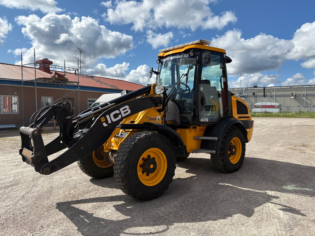 JCB 409 AG T4 - Chargeuse sur pneus: photos 1 JCB 409 AG T4 - Chargeuse sur pneus: photos 1