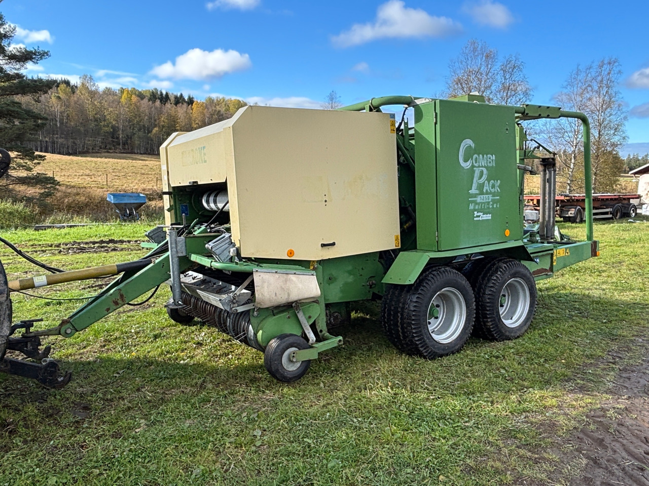 Krone Combi Pack 1250 - Presse à balles rondes: photos 1 Krone Combi Pack 1250 - Presse à balles rondes: photos 1