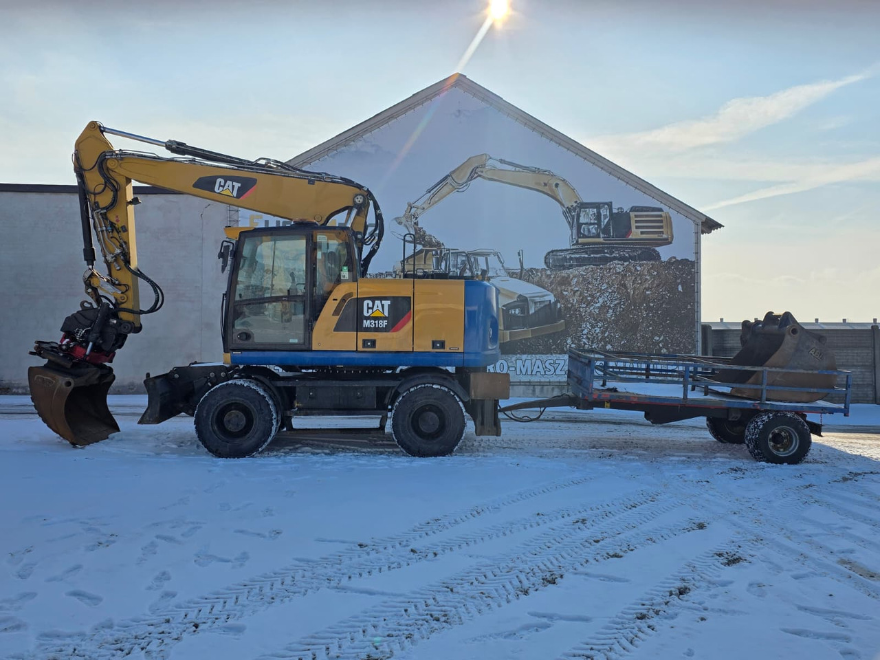 Caterpillar M318F, 2018 ROK, PODPORY + PŁUG, ROTOTILT - Pelle sur pneus: photos 1 Caterpillar M318F, 2018 ROK, PODPORY + PŁUG, ROTOTILT - Pelle sur pneus: photos 1