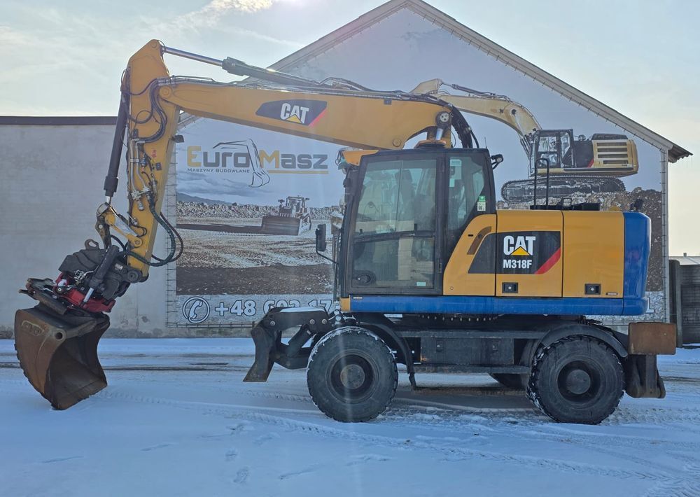Caterpillar M318F, 2018 ROK, PODPORY + PŁUG, ROTOTILT - Pelle sur pneus: photos 2 Caterpillar M318F, 2018 ROK, PODPORY + PŁUG, ROTOTILT - Pelle sur pneus: photos 2