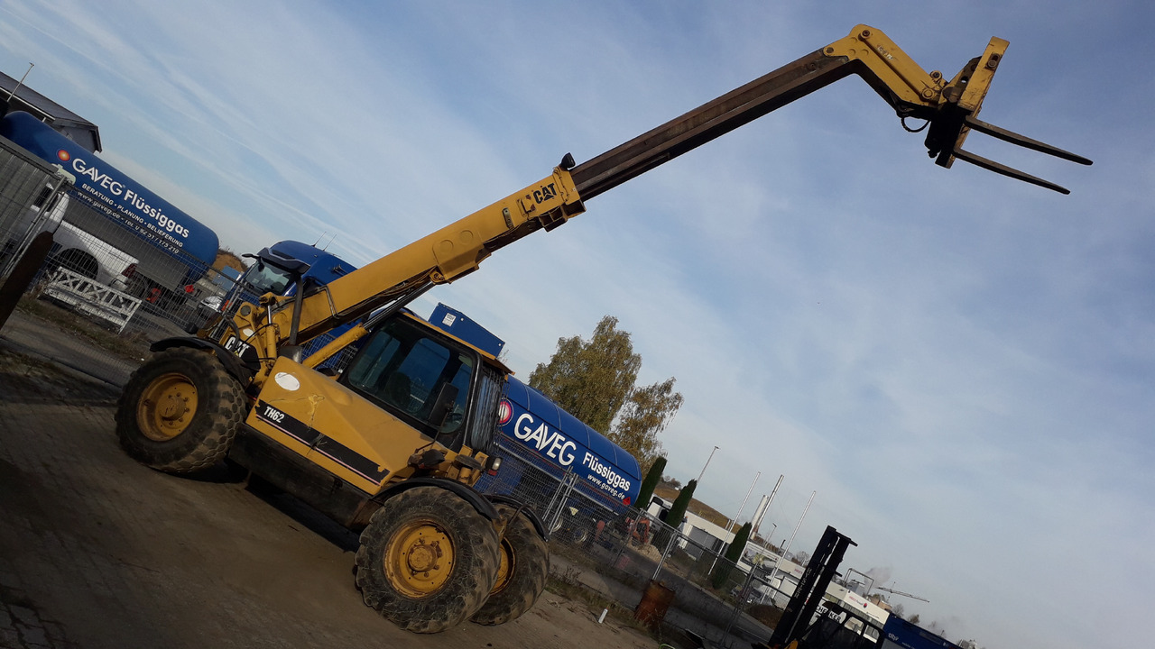 CATERPILLAR TH62 - Chargeuse sur pneus: photos 4 CATERPILLAR TH62 - Chargeuse sur pneus: photos 4