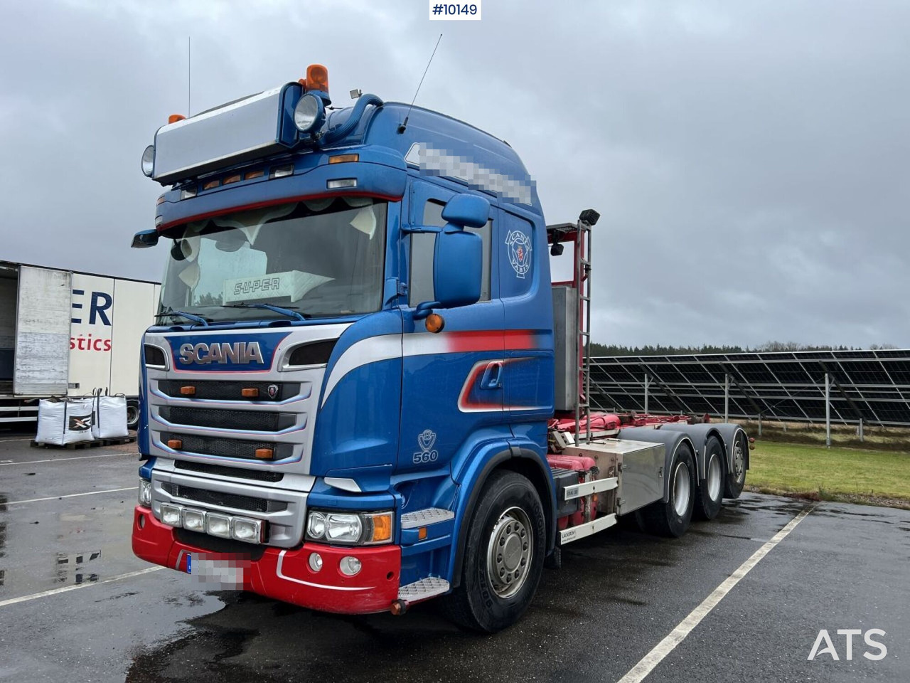 Scania R560 Tridem Hooklift Truck - Camion ampliroll: photos 1 Scania R560 Tridem Hooklift Truck - Camion ampliroll: photos 1